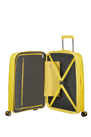 American Tourister StarVibe Mellomstor Utvidbar Koffert 67 cm Gul