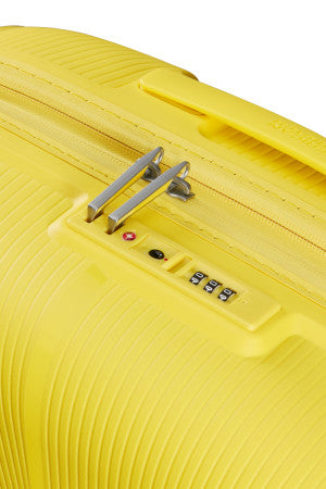 American Tourister StarVibe Mellomstor Utvidbar Koffert 67 cm Gul
