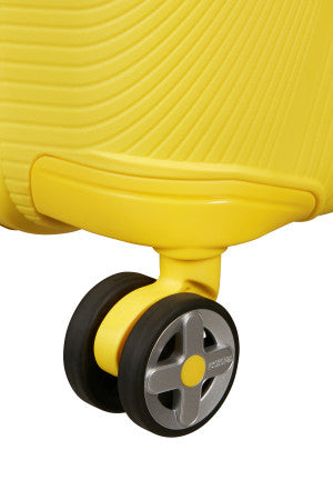 American Tourister StarVibe Mellomstor Utvidbar Koffert 67 cm Gul